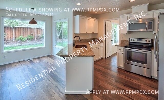 Building Photo - 23992 SW Red Fern Dr