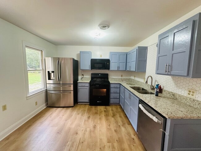 Building Photo - 8442 Wheeling Rd