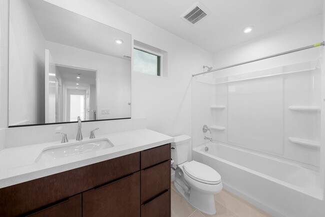 Building Photo - Available now! Brand New 4 Bedroom Townhom...