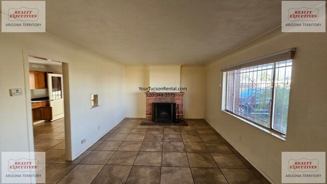 Building Photo - Speedway & Rosemont Blvd - 2/1 home with AC and fenced yard