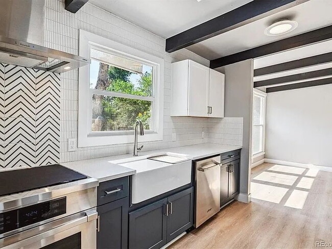 Building Photo - Quiet, Tree-Shaded Mid-Mod Steps to Downtown Littleton. Gorgeous Remodel.