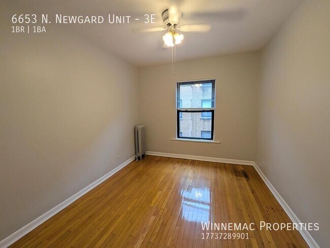 Building Photo - 6653 N Newgard Ave