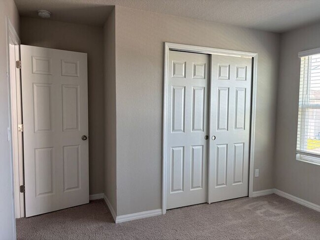 Building Photo - Like-New 4 Bedroom 3 Bath with Pond View & Two Living Spaces — Minutes to South Lake Nona