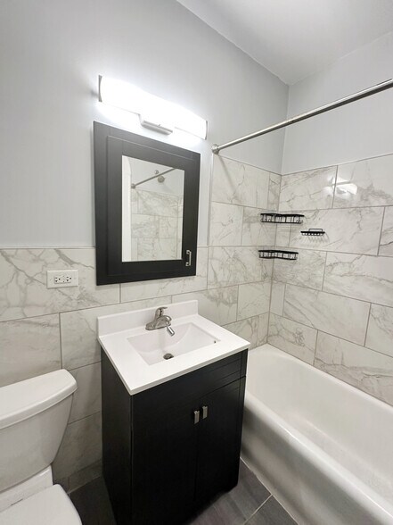 Building Photo - 4859 N Kenneth Ave