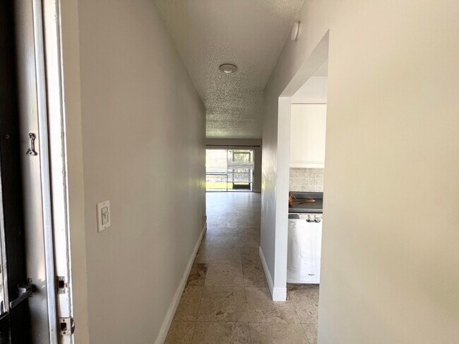 Building Photo - 717 Gardens Dr