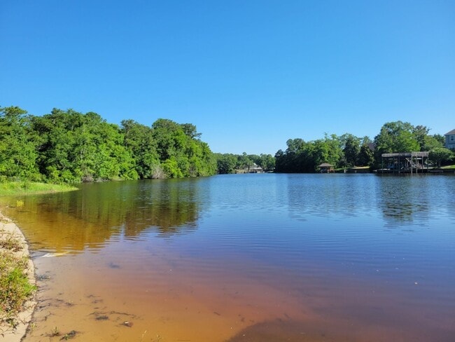 Building Photo - Riverfront Living with Private Boat Launch