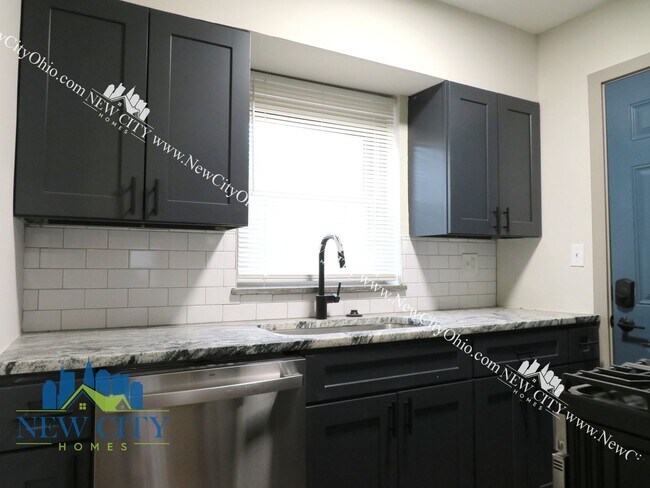 Building Photo - Newly Renovated Apartment Building