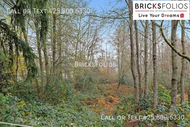 Building Photo - Welcome to Your New Tukwila Haven – Open C...