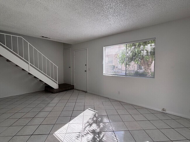 Building Photo - Charming Two-Story Townhouse with Fresh Updates & Prime Location