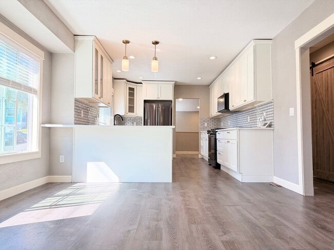 Building Photo - Lovingly Updated Home with Separate Garage, Outdoor Cat Enclosure, Finished Basement, Large Yard,...