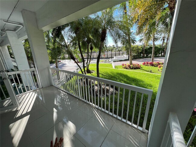 Building Photo - 10275 Collins Ave