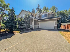 Building Photo - Move in ready 4 bed, 2.5 bath home W/ New Paint & Carpet!