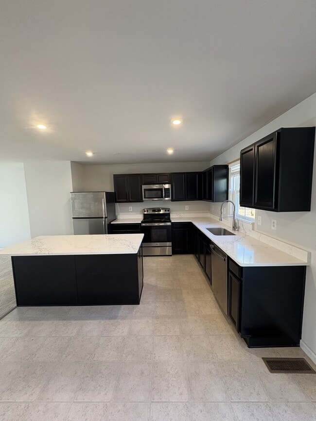 Building Photo - Stunning & Spacious Middle River 4bd/2.5ba Home with W/D, AC, Garage and more! Available now