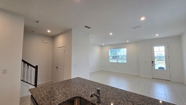 Building Photo - Brand-New Apopka 4Bed/2.5 Bath Townhome Avail for Rent! Be The first to Live Here!