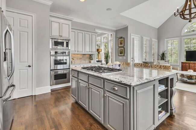Building Photo - Fully Furnished 4 Bedroom, 3.5 Bath w/ 3 Car Garage and Unfinished Basement in Governors Club