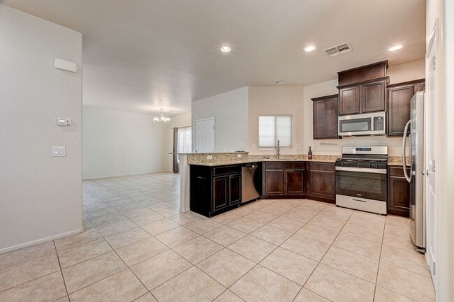 Building Photo - Adorable three bedroom in incredible SW location! Solar panels!