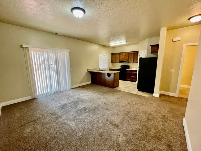 Building Photo - Pet-Friendly Three-Bedroom Townhome with G...