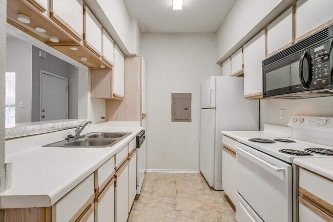 Building Photo - Nice 2 Bed, 2 Bath Second Story Condo Overlooking the Pool- 76107