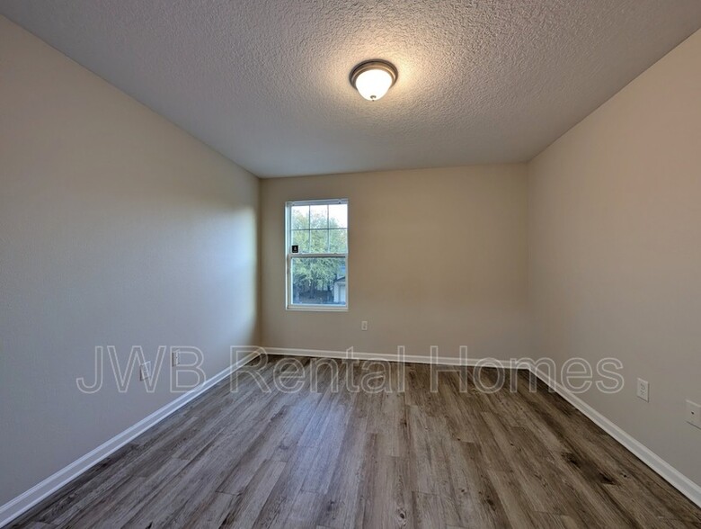 Building Photo - 7796 Playschool Ln