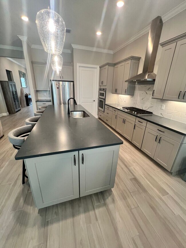 Building Photo - STUNNING LAKEFRONT 3 BEDROOM, 2.5 BATH HOM...