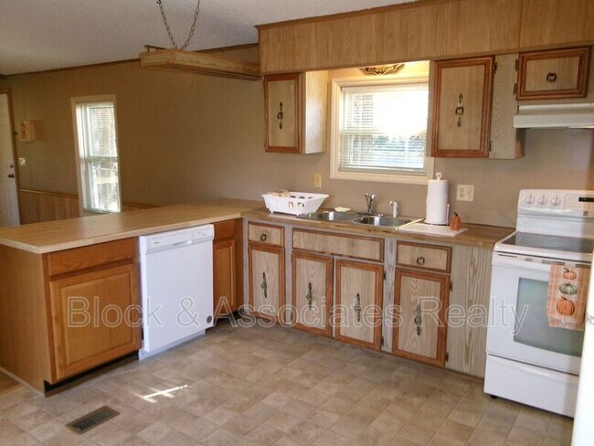 Building Photo - 6991-A Spencer Dixon Rd