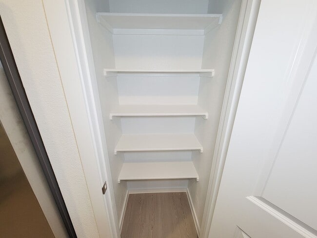 Building Photo - This lovely single-level home showcases a spacious open floorplan shared between the kitchen, din...