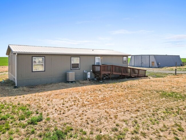 Building Photo - Country Living with a Huge Shop - 3BR on Acreage, Livestock Welcome!