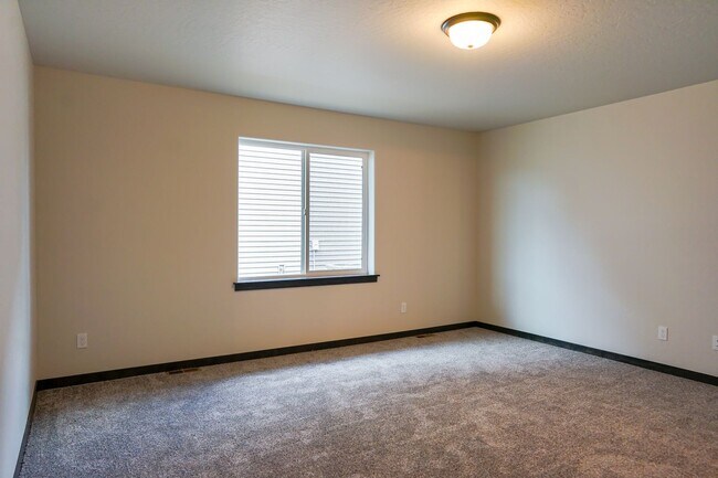 Building Photo - Newly built home with 3 car garage