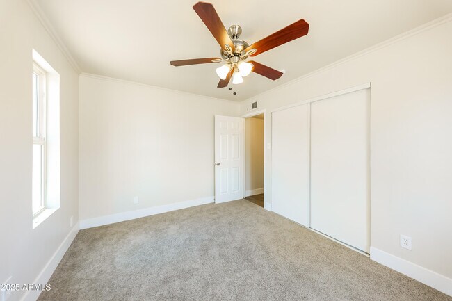 Building Photo - 4031 N 59th Dr