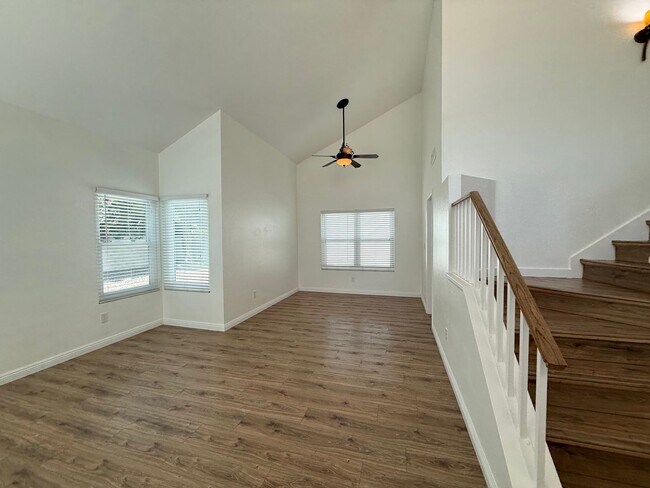 Building Photo - Corner Lot Beauty with Open Living, Guest Suite Down & Expansive Backyard