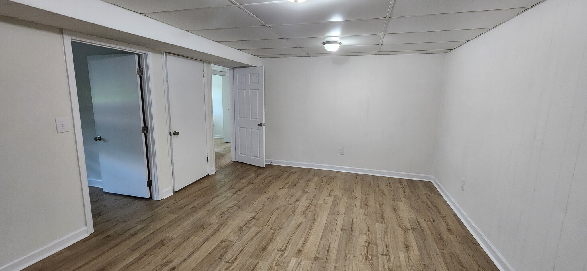 Downstairs Main Room / Den - 1704 Danbury Dr