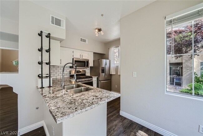 Building Photo - 9050 W Warm Springs Rd