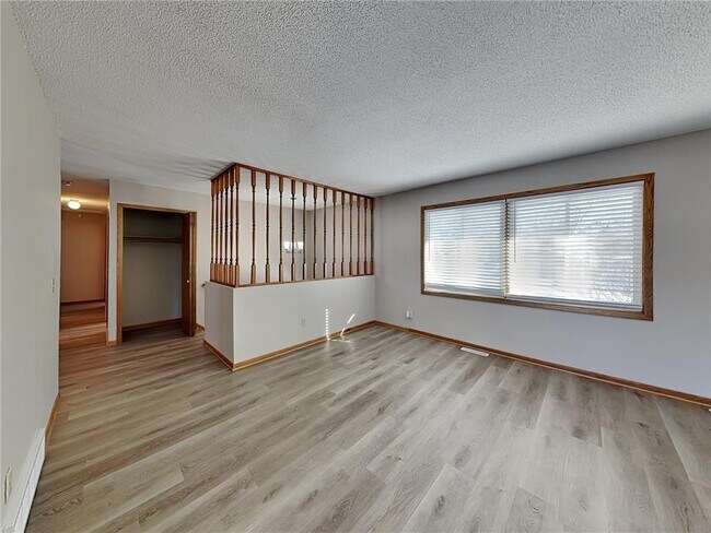 Building Photo - 11051 Quebec Ave N