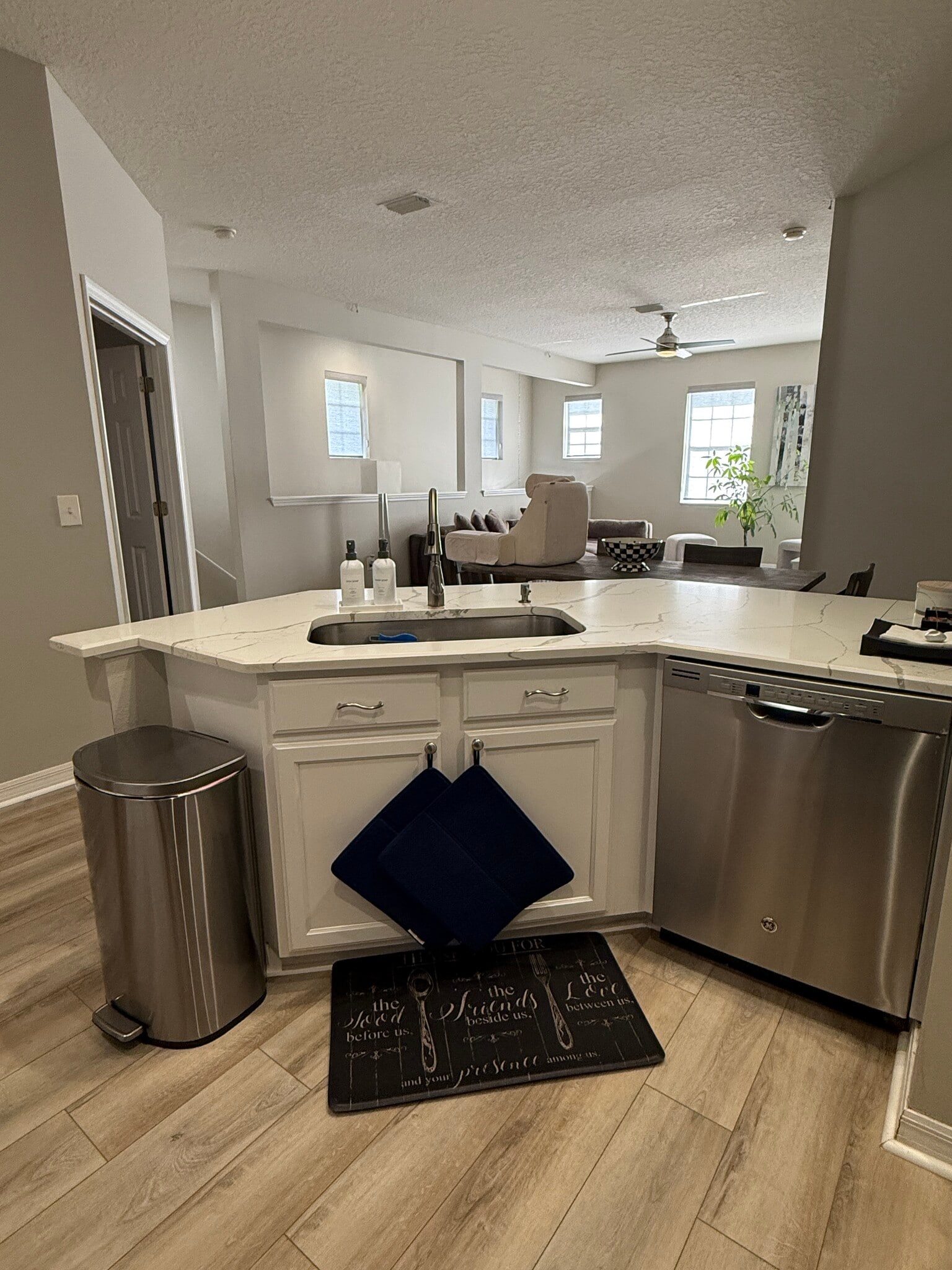 Kitchen overlooking entrance, living and dining area - 9410 Georgian Park Ln