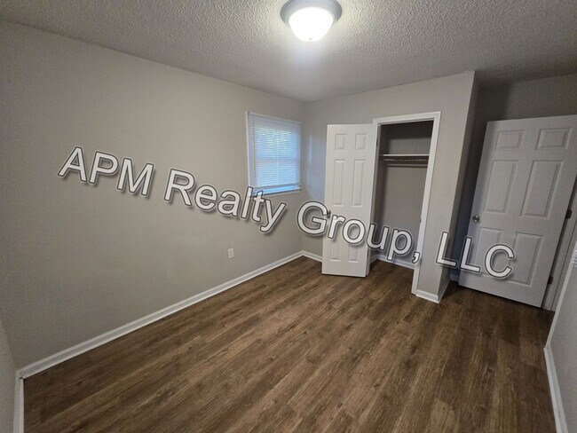 Building Photo - Four-bedroom house off North Main