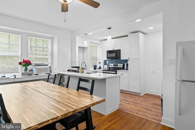 Building Photo - Welcome to this sunny and updated 4-bedroom, 2-bath row home in the heart of Mt. Airy! W/D! Large...