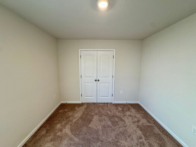 Building Photo - Located in Creedmore Hills a 4BR/2.5BA home with 2 car garage