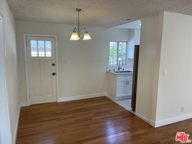 Building Photo - 10631 Tinker Ave