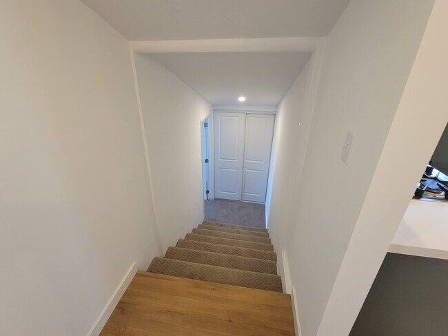 Stairs to closet and bedroom 2 - 7934 Zeus Dr