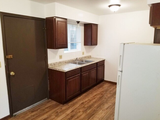Building Photo - $200 OFF 1st Month! Updated 2 Bed, 1 Bath Townhouse next to NAU!! Students & Sm. Pets OK !! Avail...
