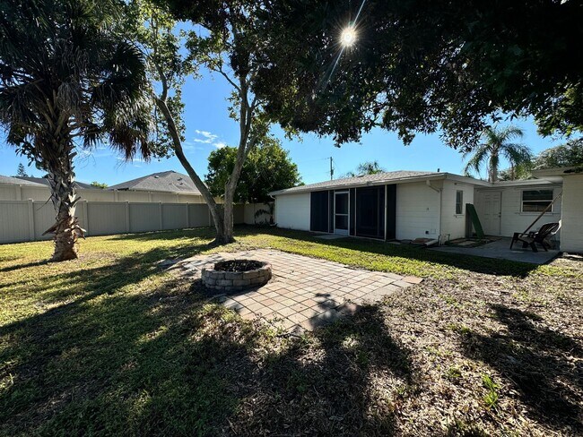 Building Photo - 2/2 with Fenced Yard, Garage and Laundry, ...