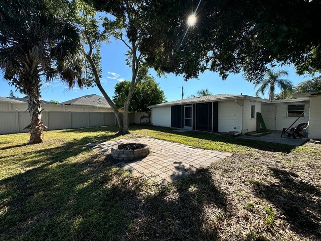 Building Photo - 2/2 with Fenced Yard, Garage and Laundry, Available Now!