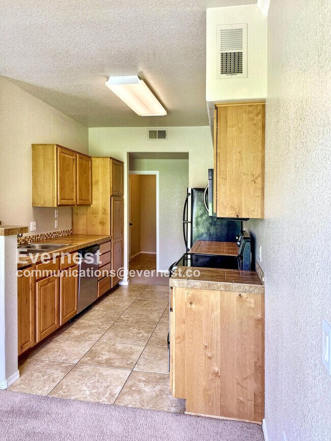Building Photo - 7050 E Sunrise Dr