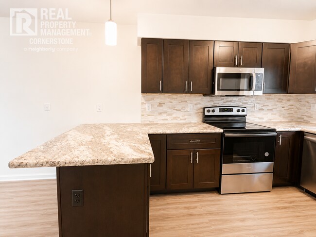 Building Photo - Modern Comfort Meets Peaceful Living