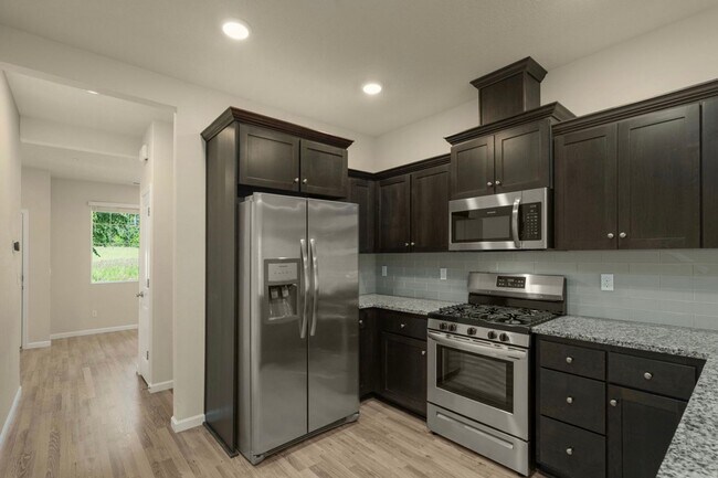 Building Photo - Beautiful North Bethany Home with 3 Bedrooms + Expansive Bonus Room, 2-Car Tandem Garage & Prime ...