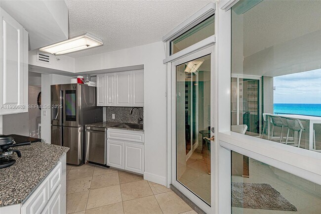 Building Photo - 6301 Collins Ave