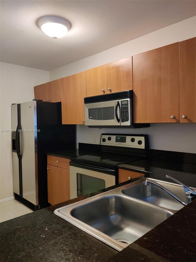 Building Photo - 1865 Palm Cove Blvd