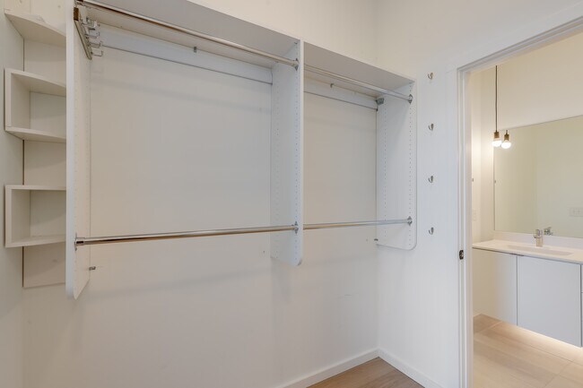 Master Closet connects from master bed to bath - 600 S Duke St