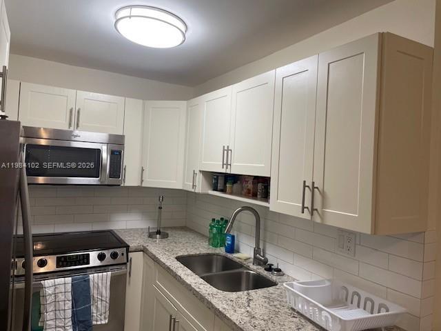 Building Photo - 6620 W 2nd Ct