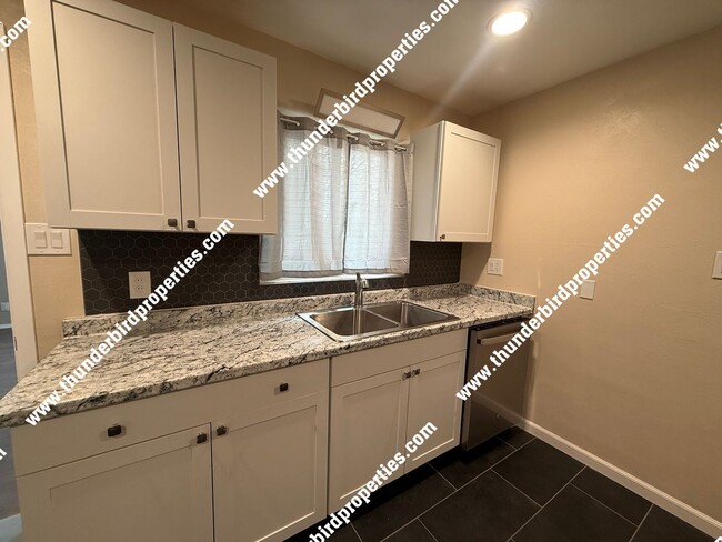 Building Photo - Beautifully remodeled Uptown location